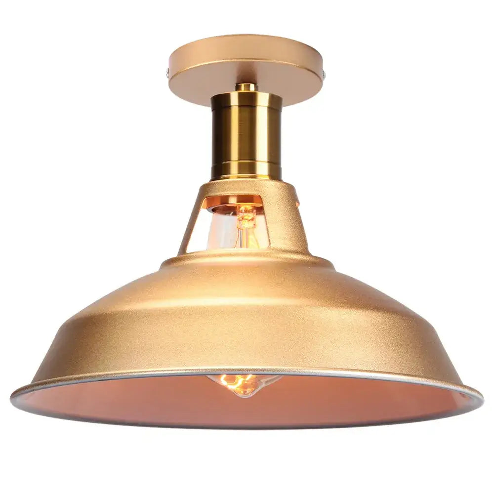 Gold-finished industrial dome metal ceiling light shade with exposed filament bulb for kitchen bar lighting