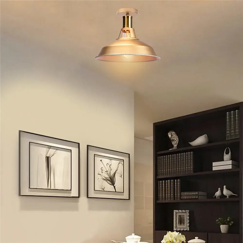 A warm-toned brass industrial dome metal ceiling light shade ideal for kitchen bar lighting
