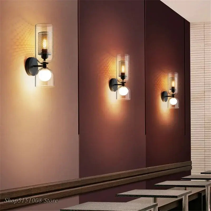 Black metal double head iron net wall lamp with clear glass cylinder and frosted glass shade for bedroom sconce