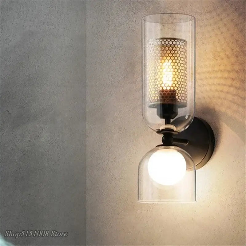 Industrial double head iron net wall lamp with clear glass cylinder and frosted globe shade for bedroom use