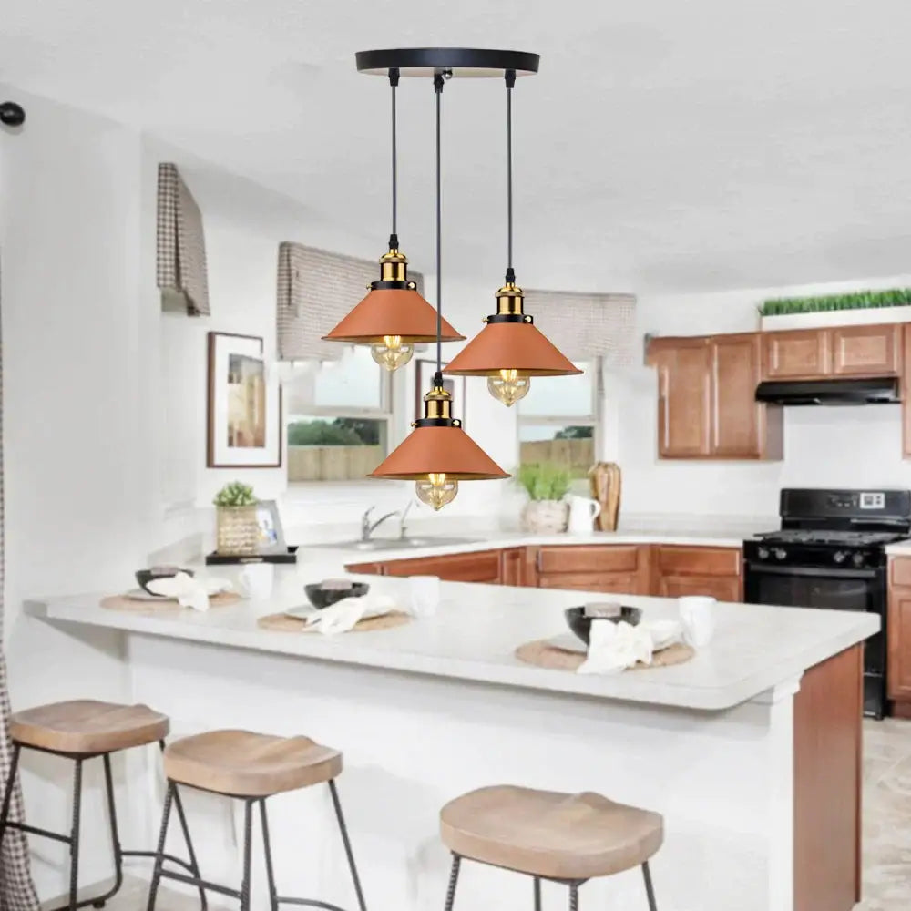 Industrial farmhouse brown pendant light with three copper bell-shaped shades and brass accents for kitchen island decorbites industrial farmhouse