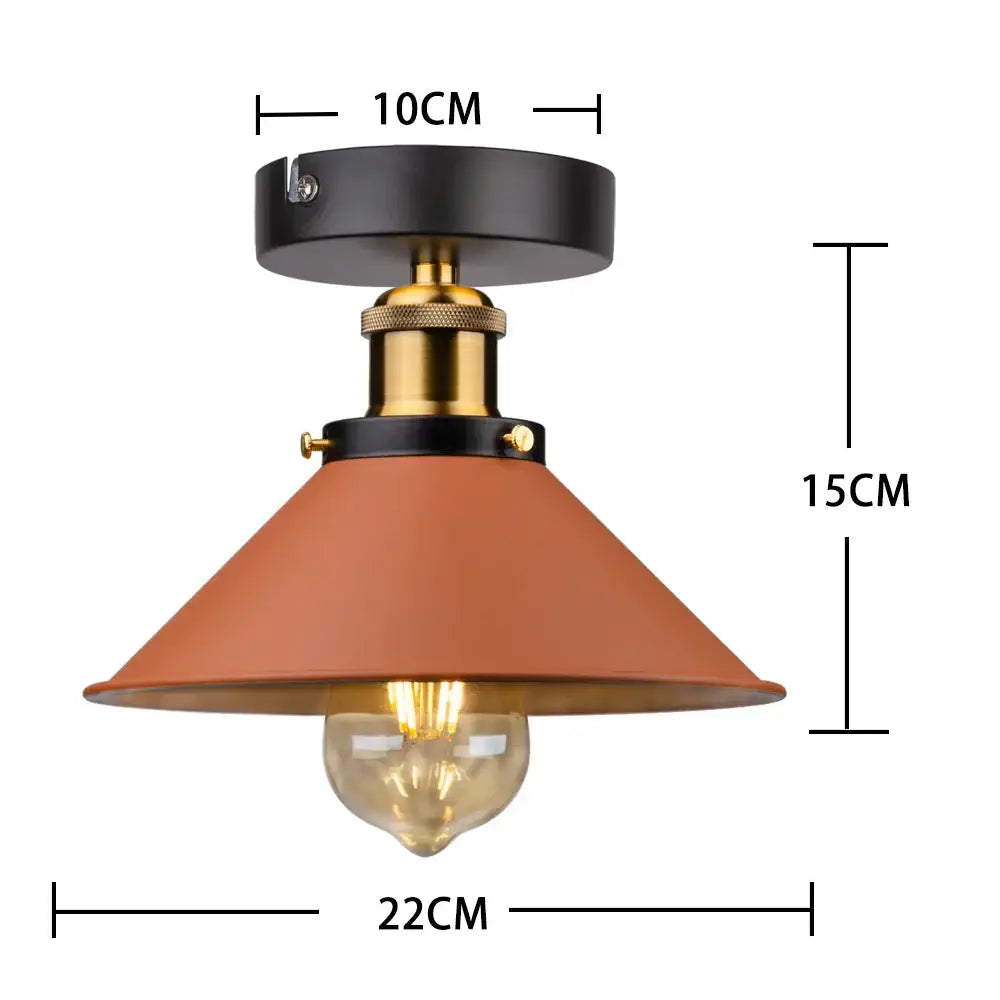 Industrial farmhouse brown pendant light with matte black base brass accents and terracotta conical shade for kitchen island decorbites industrial farmhouse
