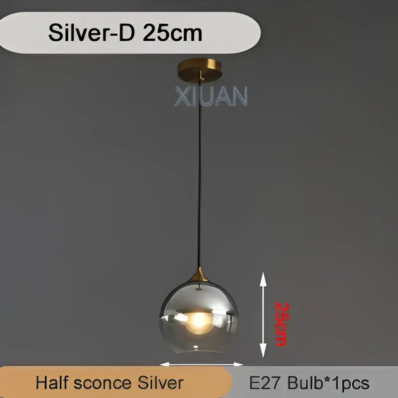 Silver spherical industrial glass pendant light with clear glass globe and brass accents for kitchen dining decorbites industrial glass