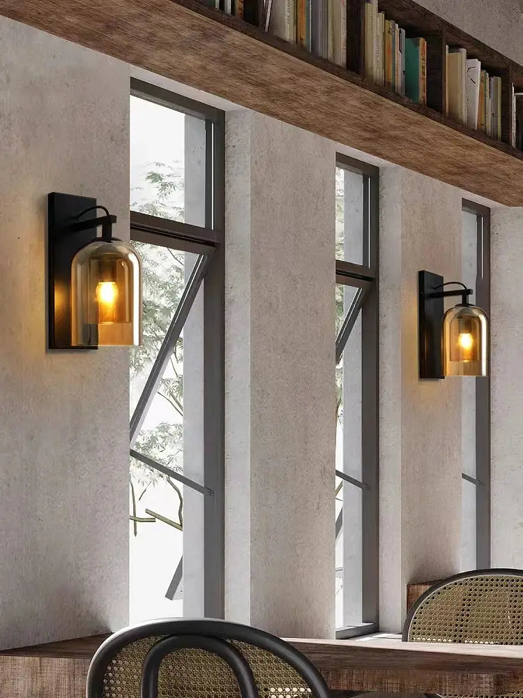 Black metal wall lamps with warm amber glass globe decorbites industrial glass wall sconce for bedroom decor