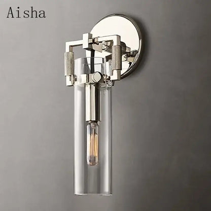 A sleek industrial glass wall lamp with polished chrome finish and clear shade for bedroom decorbites industrial glass