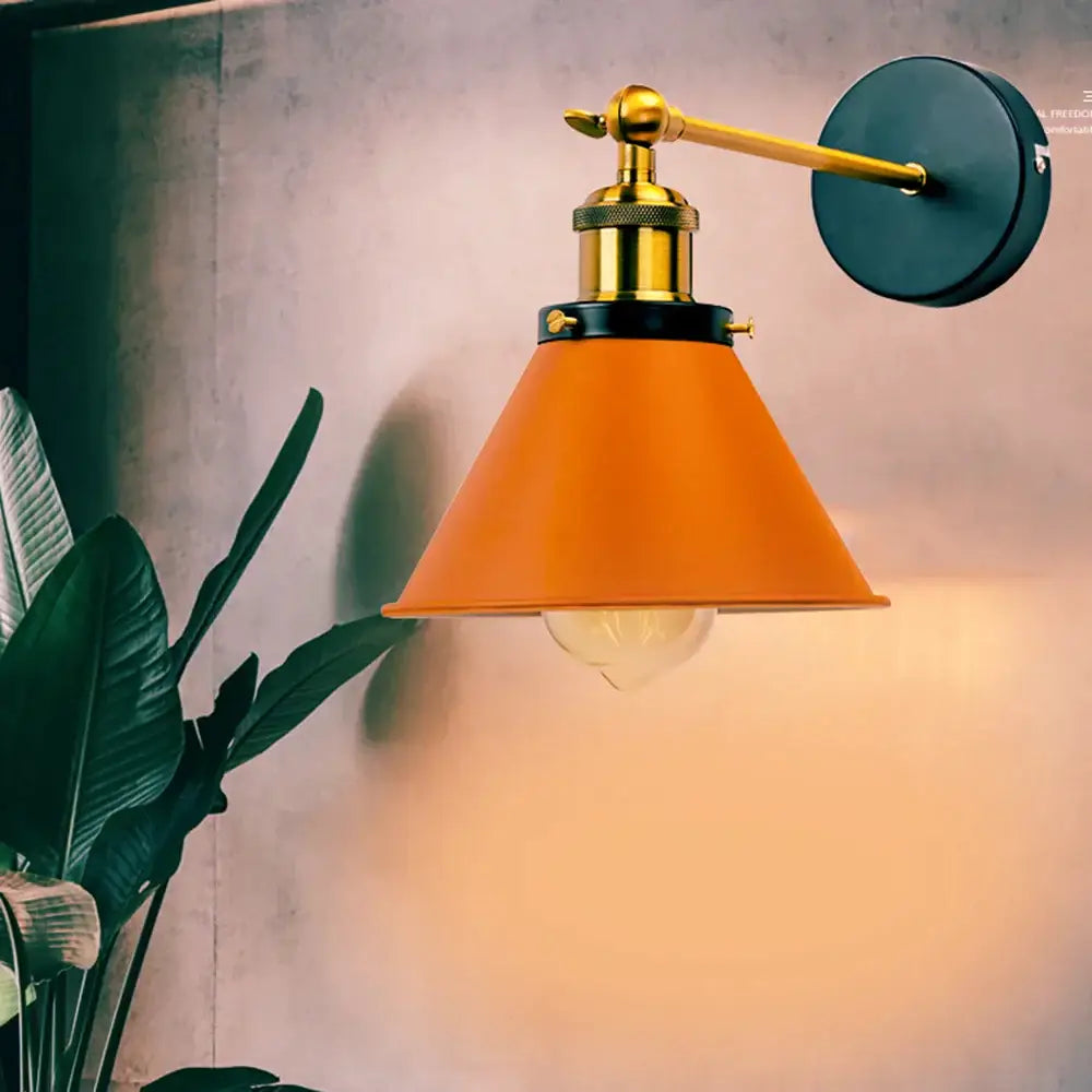Industrial gold wall lamp with vibrant orange conical lampshade brass sconce and adjustable arm for bedroom decorbites industrial gold