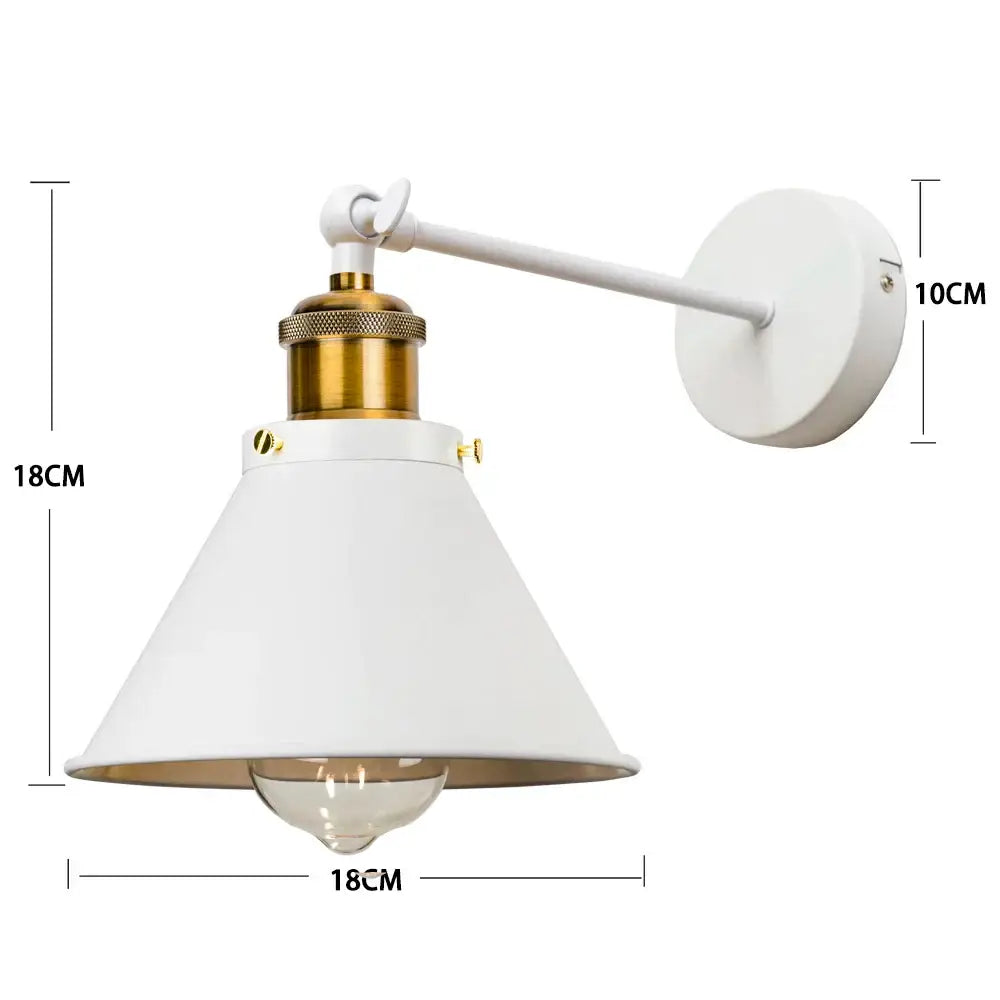 White industrial gold wall lamp with brass sconce base and adjustable arm by decorbites for bedroom decor