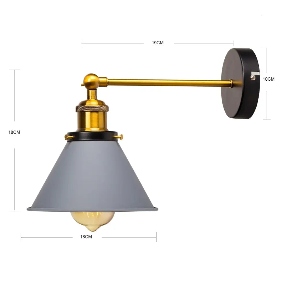Industrial gold wall lamp with matte gray conical shade, brass arm, and black backplate for decorbites industrial gold decor
