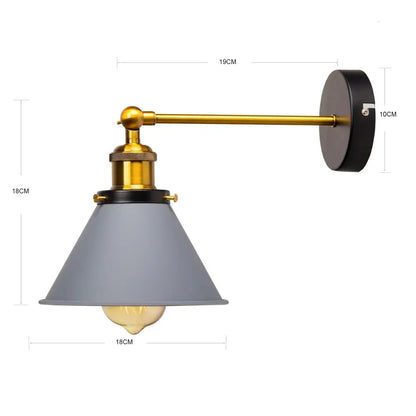 Industrial gold wall lamp with matte gray conical shade, brass arm, and black backplate for decorbites industrial gold decor