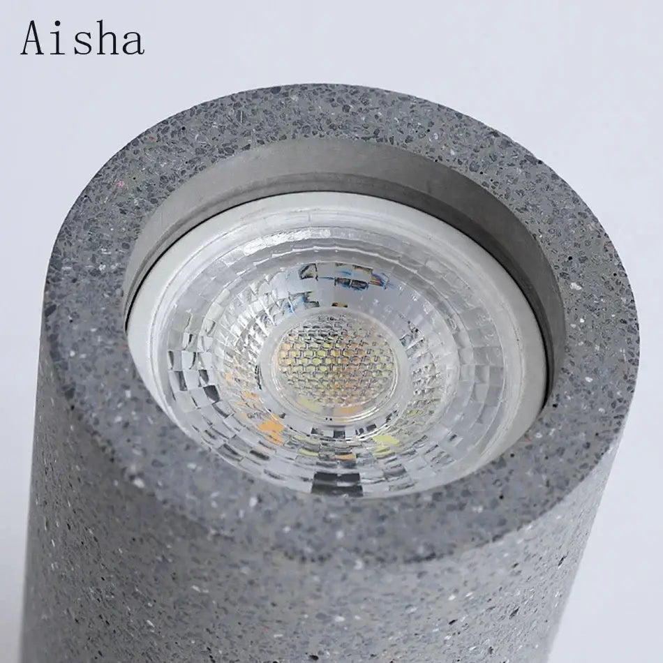 Industrial led ceiling gray speckled concrete cylindrical led downlight with clear lens and metallic trim for kitchen decorbites