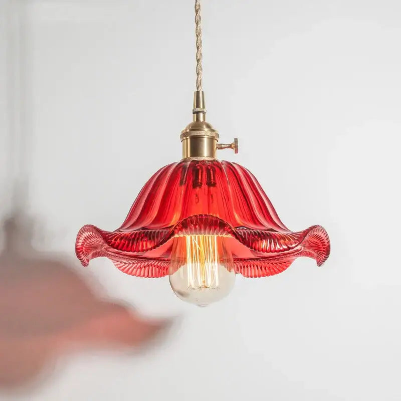 A vibrant red glass industrial pendant light with fluted petal design and brass hardware for dining room decorbites glass industrial