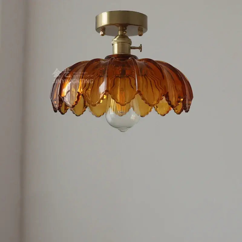 Vintage-style pendant light with brass fixture and amber petal glass shades for decorbites glass industrial pendant use