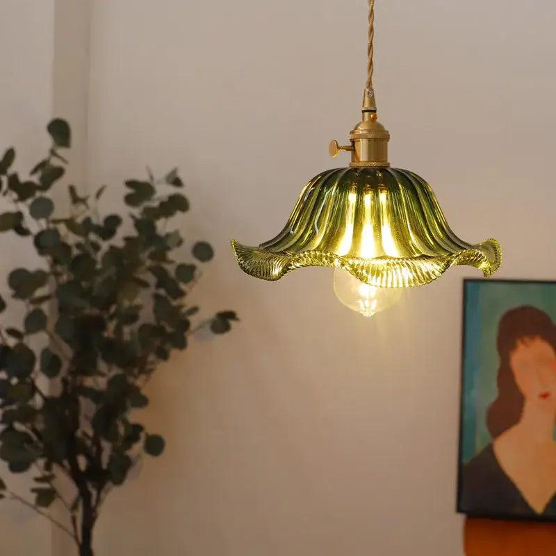 Green glass industrial pendant light with brass-finished copper socket and twisted cord for dining room decorbites glass industrial
