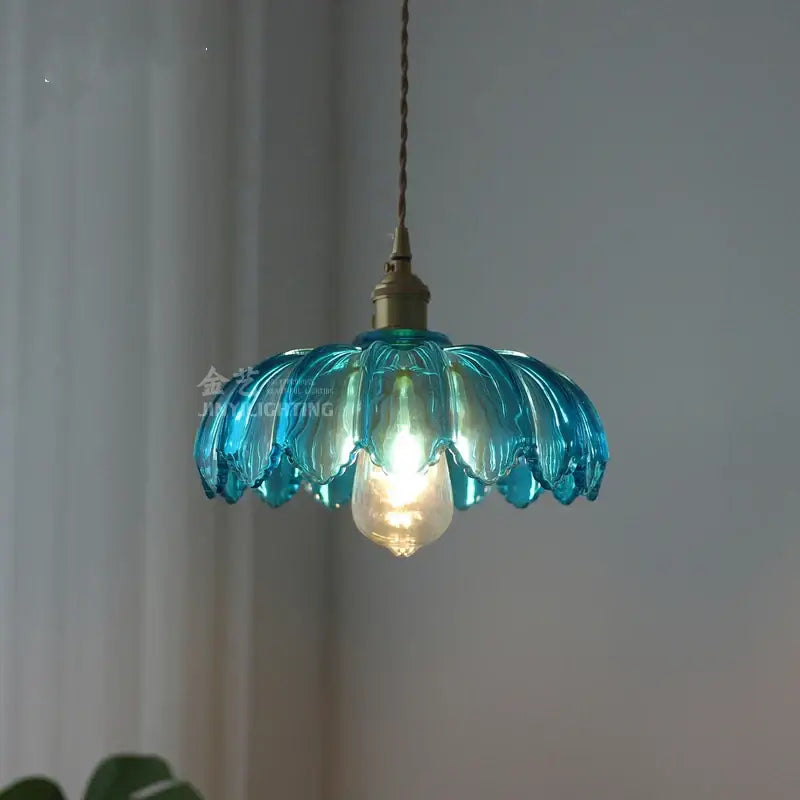 Industrial green petal glass pendant light with translucent turquoise petals and copper socket for dining room decorbites glass industrial