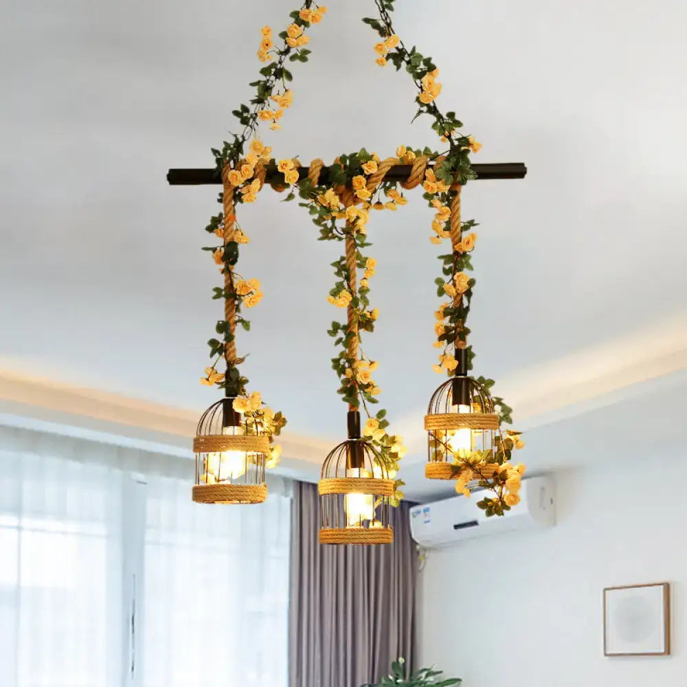 Rattan birdcage pendant light with woven industrial hemp rope and yellow floral garlands for restaurant island lighting