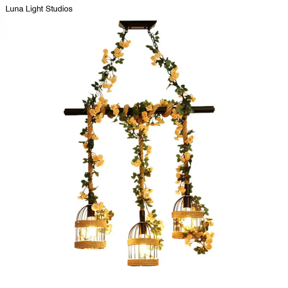 Rustic black DecorBites™ birdcage chandelier with three woven lights and industrial hemp rope, ideal for restaurant island lighting