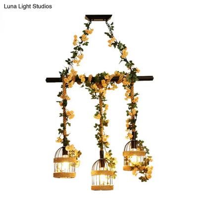 Rustic black DecorBites™ birdcage chandelier with three woven lights and industrial hemp rope, ideal for restaurant island lighting