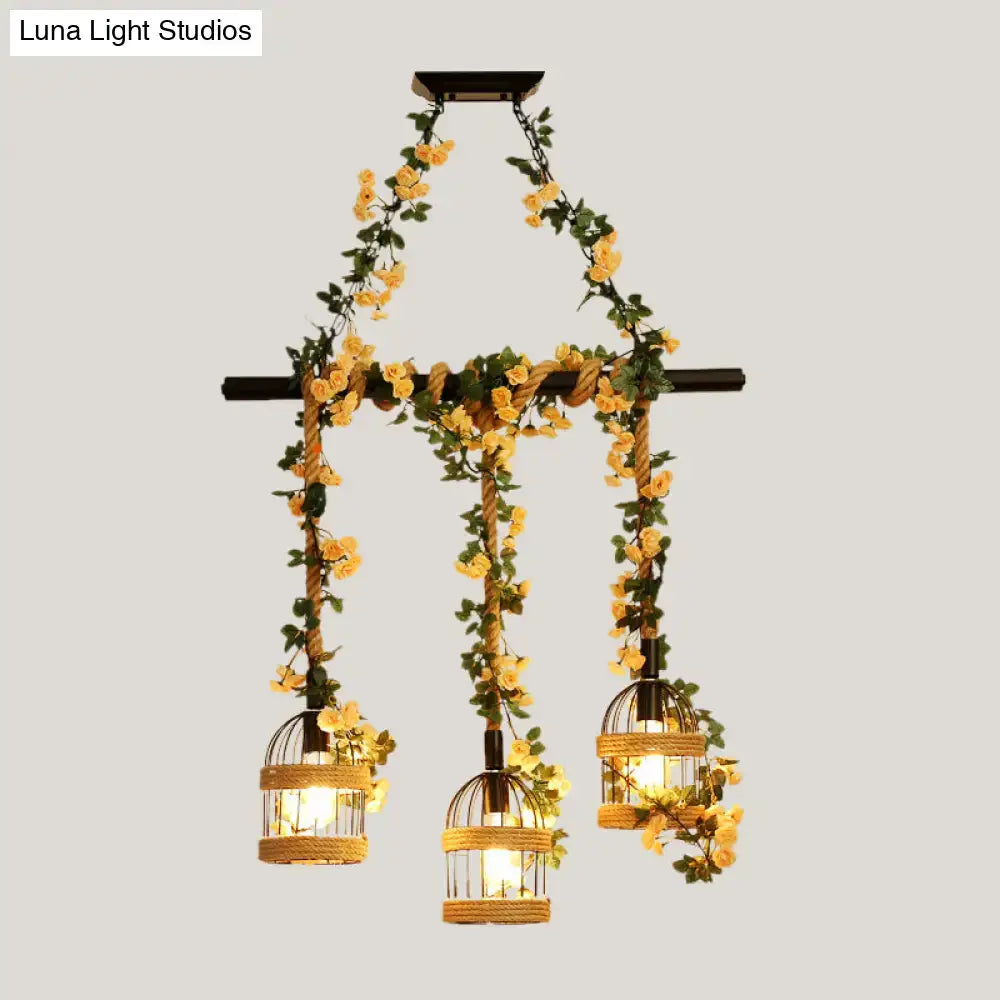 Rustic-style decorbites™ birdcage chandelier with industrial hemp rope and yellow floral vines for restaurant island lighting