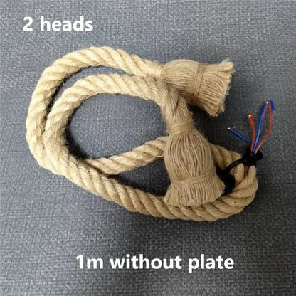 Beige industrial hemp rope pendant light with braided design, tasselled ends, and exposed wiring for living room decorbites decor
