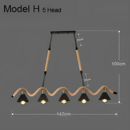 Industrial hemp rope pendant light with four black metal shades and natural rope detailing for kitchen decorbites industrial hemp