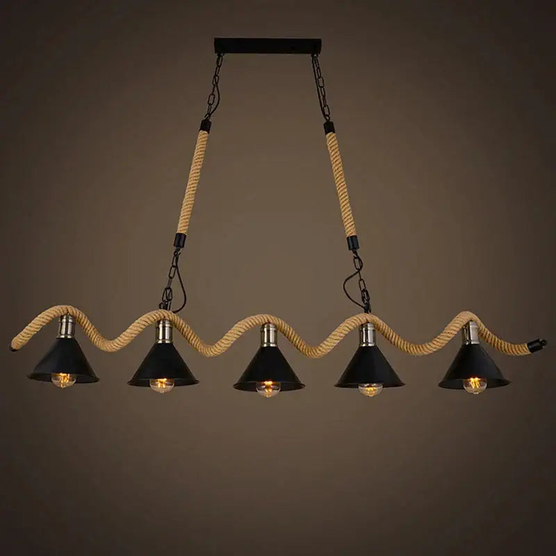 Industrial hemp rope pendant light with four black shades suspended by beige rope and metal chains for kitchen decor