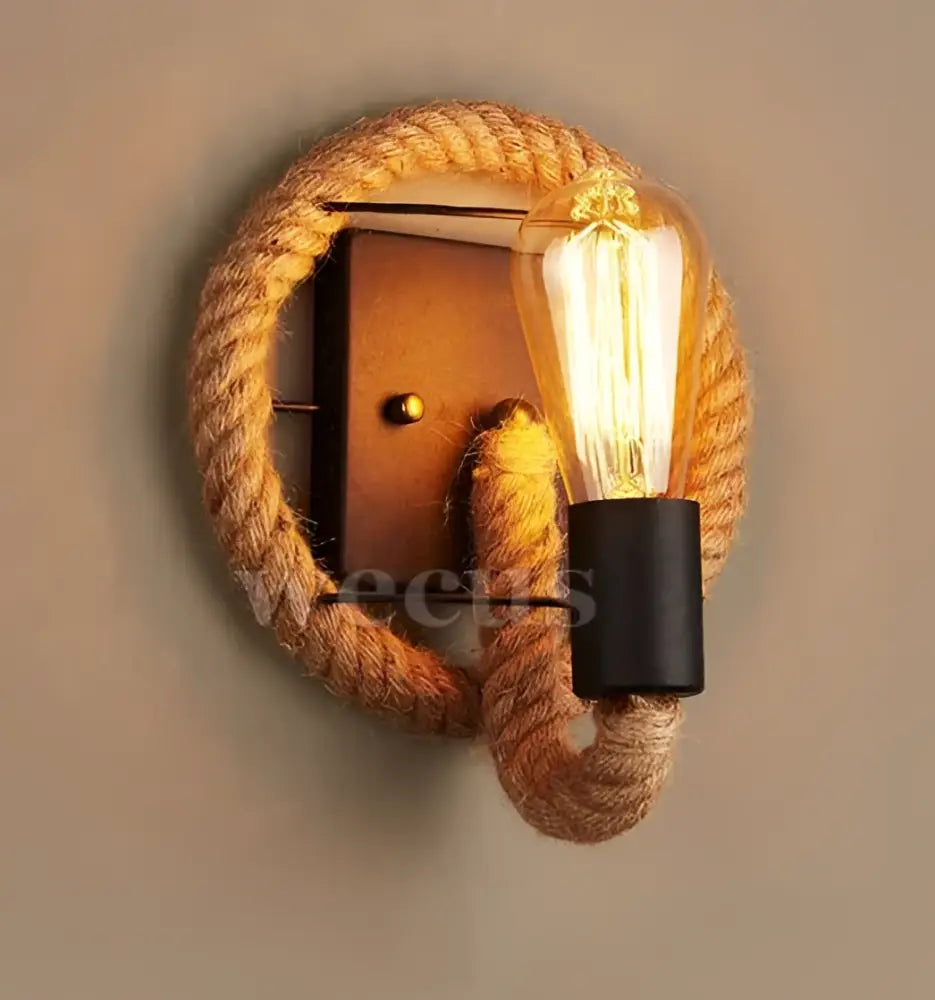 Rustic industrial hemp rope wall lamp with natural-colored rope wrapped metal frame and exposed filament bulb for decorbites