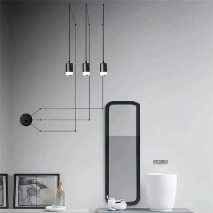 Modern black industrial iron art pendant light with cylindrical shades for minimalist bathroom decorbites industrial iron