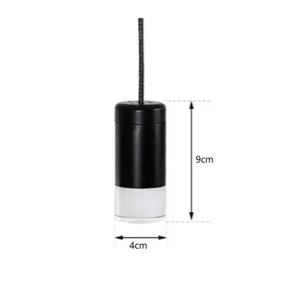 Black and white cylindrical pendant light with textured cord industrial iron art decorbites industrial iron dining room decor