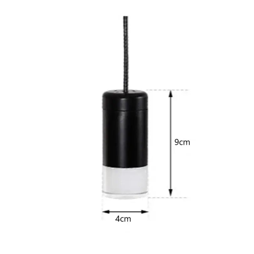 Black and white cylindrical pendant light with textured cord industrial iron art decorbites industrial iron dining room decor