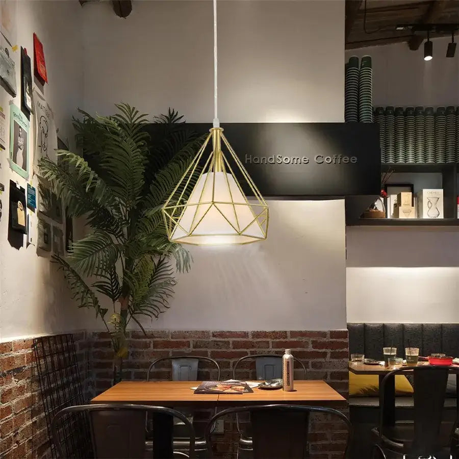 Geometric gold pendant lamp with white fabric shade and iron cage for kitchen dining room decorbites industrial iron
