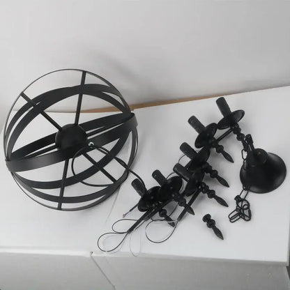 Black metal spherical industrial iron chandelier with candle-style lights and chains decorbites industrial for living room