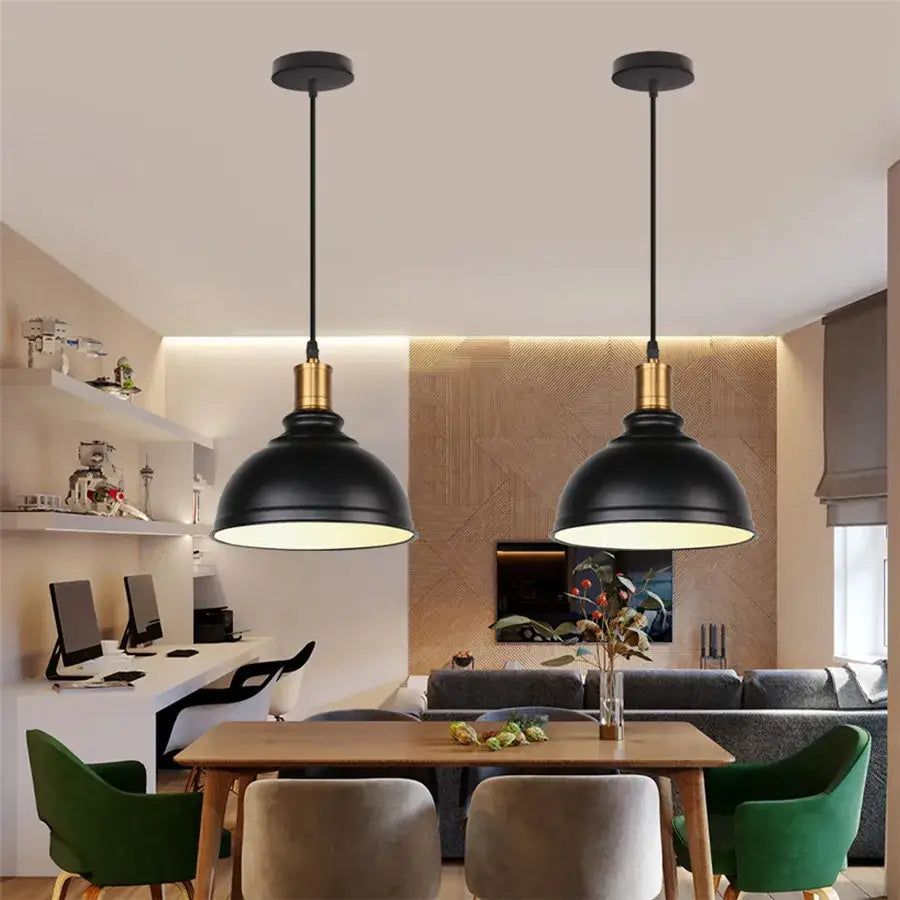 Black industrial iron dome pendant light with brass accents hanging above dining table for kitchen cafe decorbites iron dome