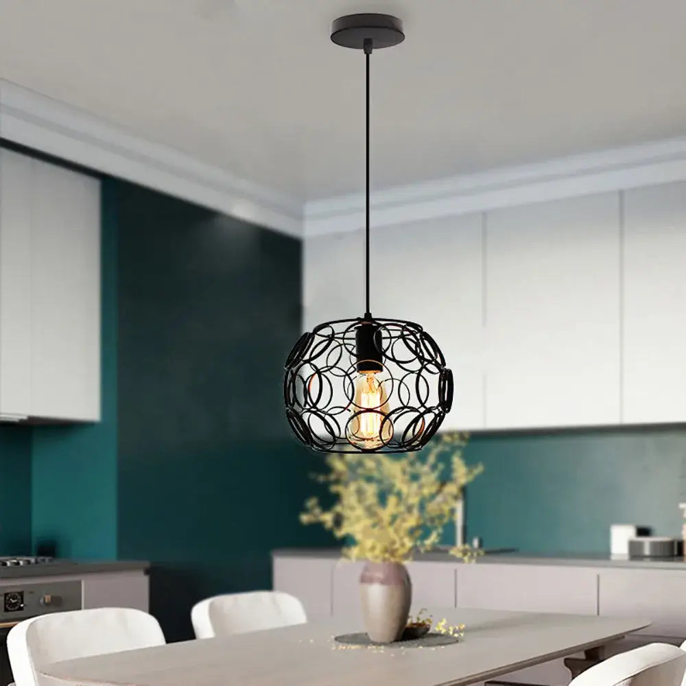 Black wrought iron spherical industrial iron pendant light with exposed filament bulbs for dining room decorbites industrial iron pendant