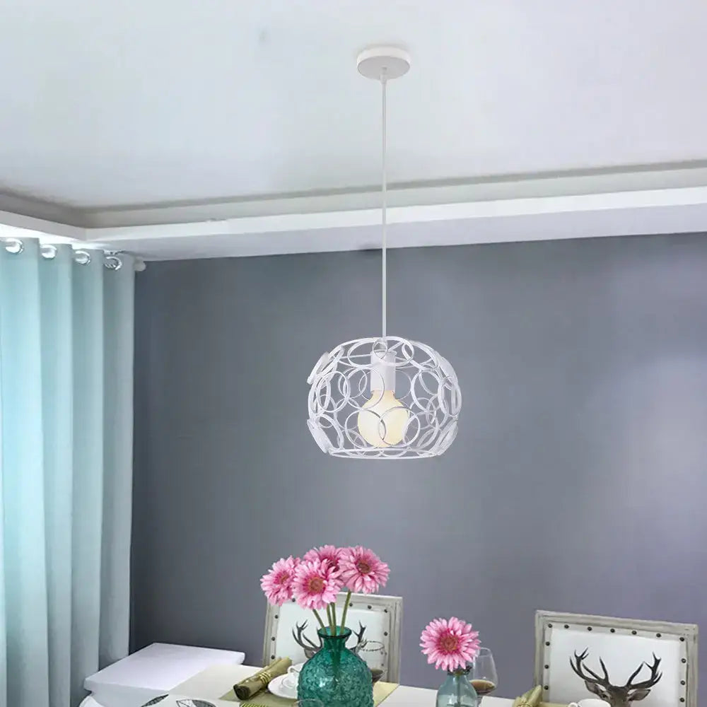 White spherical pendant light with intricate black wireframe design from decorbites industrial iron pendant lights collection