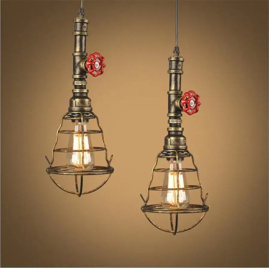 Industrial iron pipe pendant light kitchen black and brass with valve features brass-finished pipes and wire cages