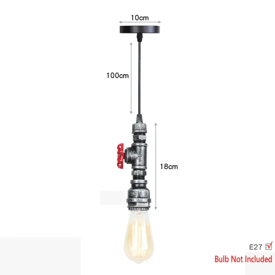 Industrial iron pipe pendant light with black metal pipe, brass valve accent, and exposed Edison bulb for kitchen decorbites