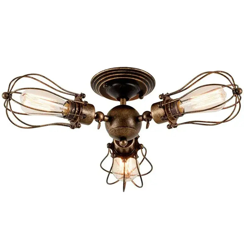 Vintage-style industrial iron rust water pipe wall lights with three exposed edison bulbs and wire cages in brass finish