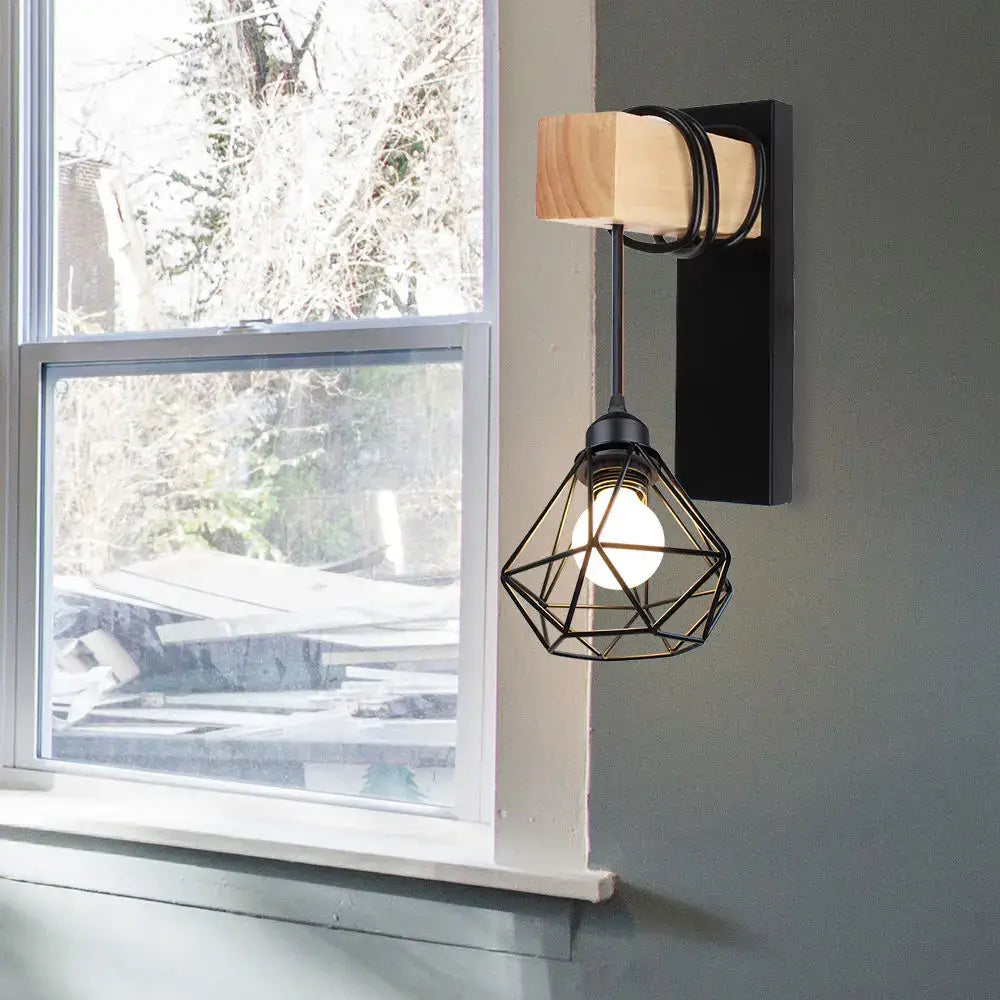 Black metal geometric cage industrial iron wall sconce with natural wood pulley and exposed bulb for cafe decorbites decor