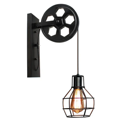 Black industrial iron wall sconce with wooden pulley and cage-encased bulb for decorbites industrial iron cafe decor
