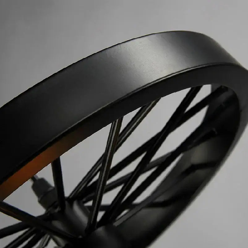 Black matte industrial iron wheel chandelier pendant light with sleek modern design for decorbites industrial iron decor