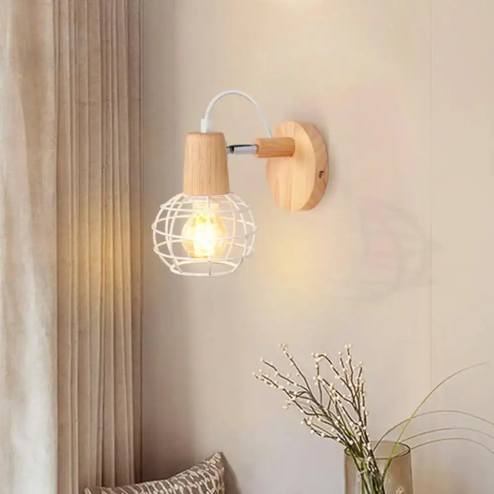 A warm-toned industrial led wood wall sconce with a natural wood base and white wire cage for bedroom decorbites industrial led