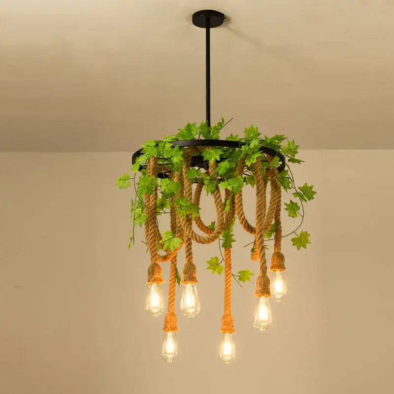 A decorbites industrial loft chandelier with black metal frame natural rope and green ivy for dining room decor