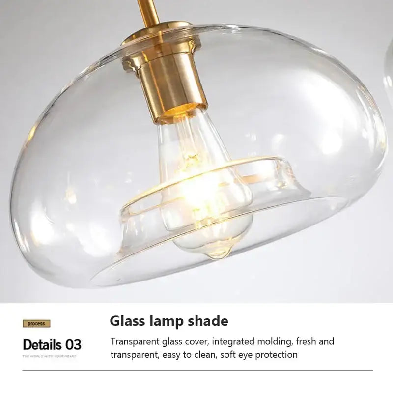 Clear glass pendant light with brass-finished fixture and exposed filament bulb from decorbites industrial loft glass trio