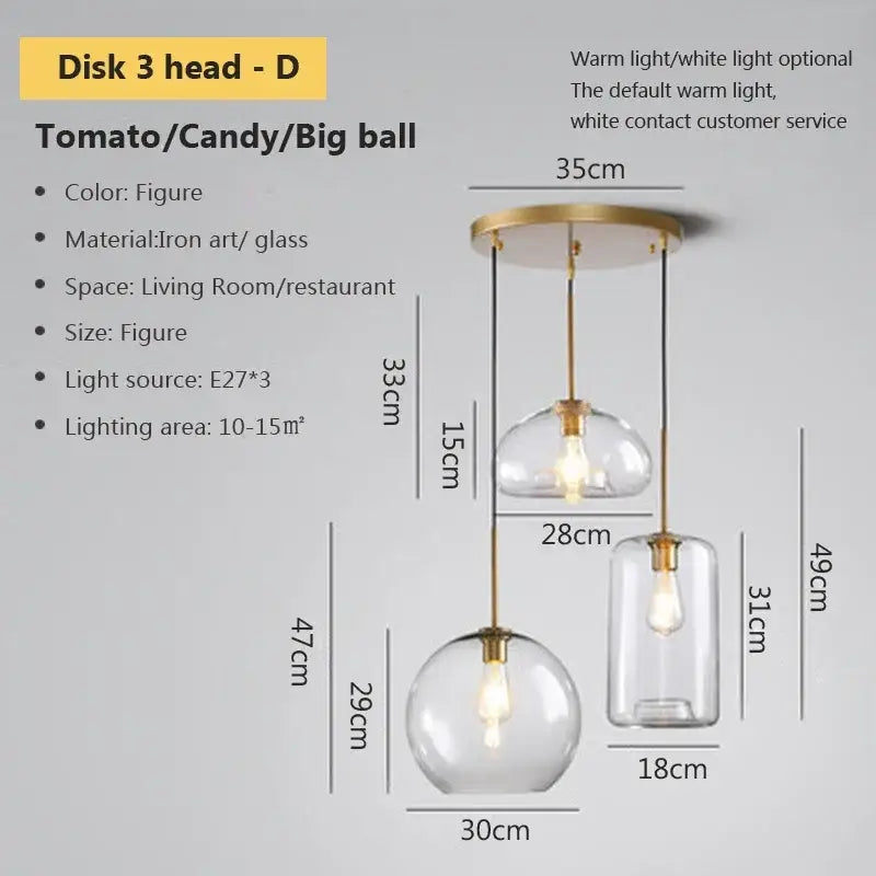 Modern three-head industrial loft glass pendant light with clear globes brass accents and warm white led bulbs for dining decorbites