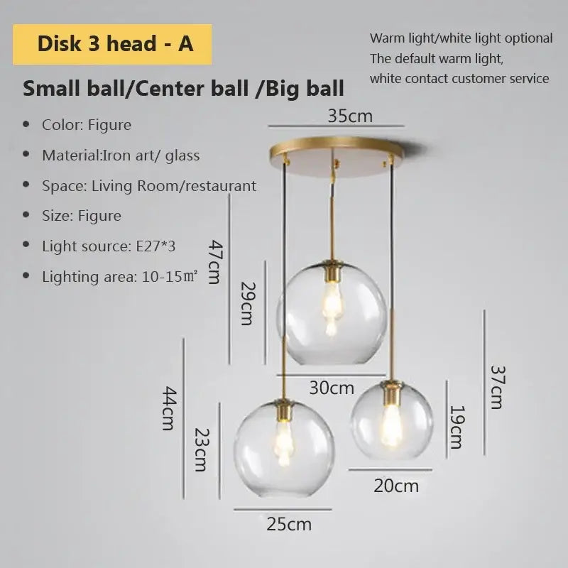 Modern three-ball pendant light with clear glass spheres and brass-toned iron art for decorbites industrial loft dining room