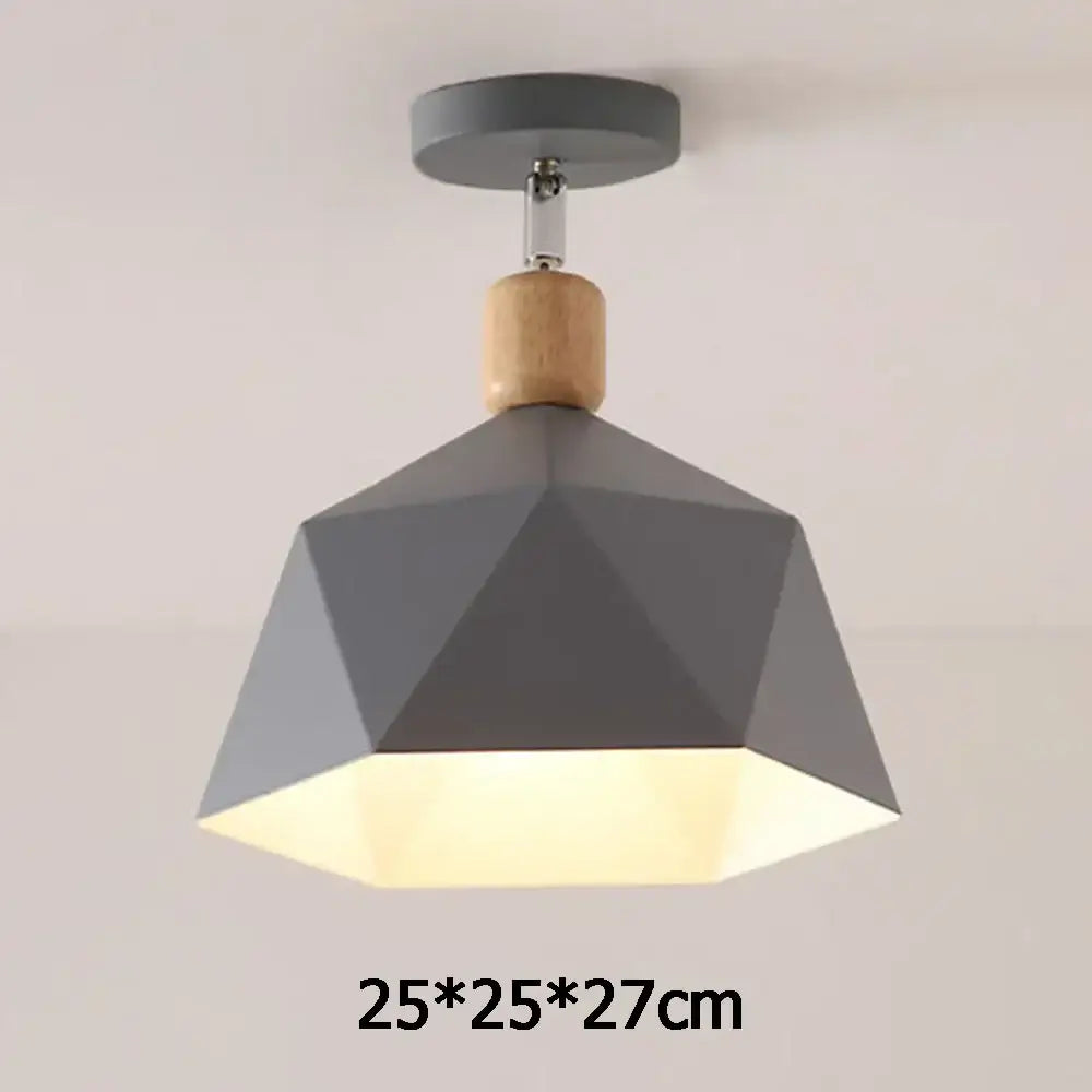 Gray geometric pendant light with wooden accent and metallic mounting hardware for decorbites industrial loft ceiling decor