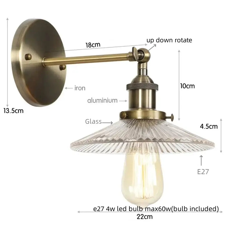 Antique brass-finished industrial loft led wall light with textured glass shade and exposed Edison bulb for bedroom decorbites industrial loft
