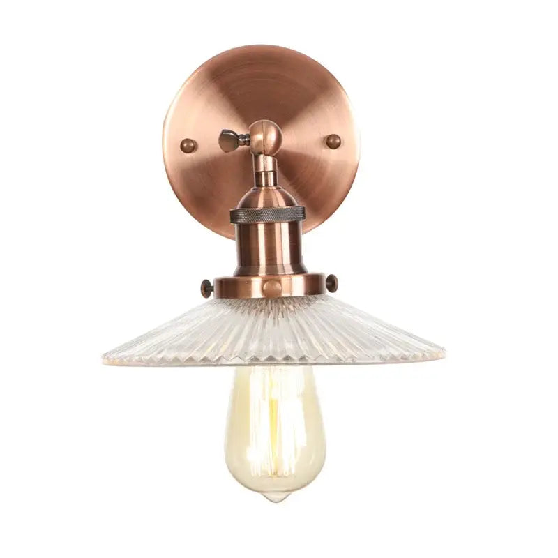 Copper-finished industrial loft led wall light with faceted glass shade and exposed filament bulb for bedroom decorbites decor