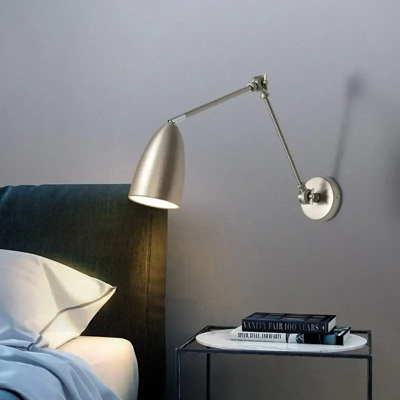 Silver wall lamp with adjustable swing long arm and conical shade in a sleek modern design for bedroom decorbites adjustable swing