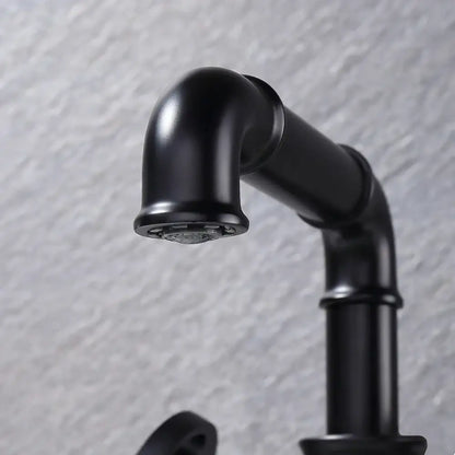 Industrial matte black brass bathroom faucet with curved spout and visible pipe joints for decorbites black brass decor